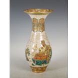 A Japanese Satsuma pottery vase, Meiji Period, decorated with Sennin figures, within richly gilded