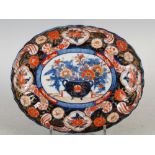 A late 19th/ early 20th century Imari oval-shaped dish, of lobbed form decorated with an oval