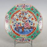 A clobbered Chinese porcelain blue and white octagonal-shaped plate, Qing Dynasty, decorated with