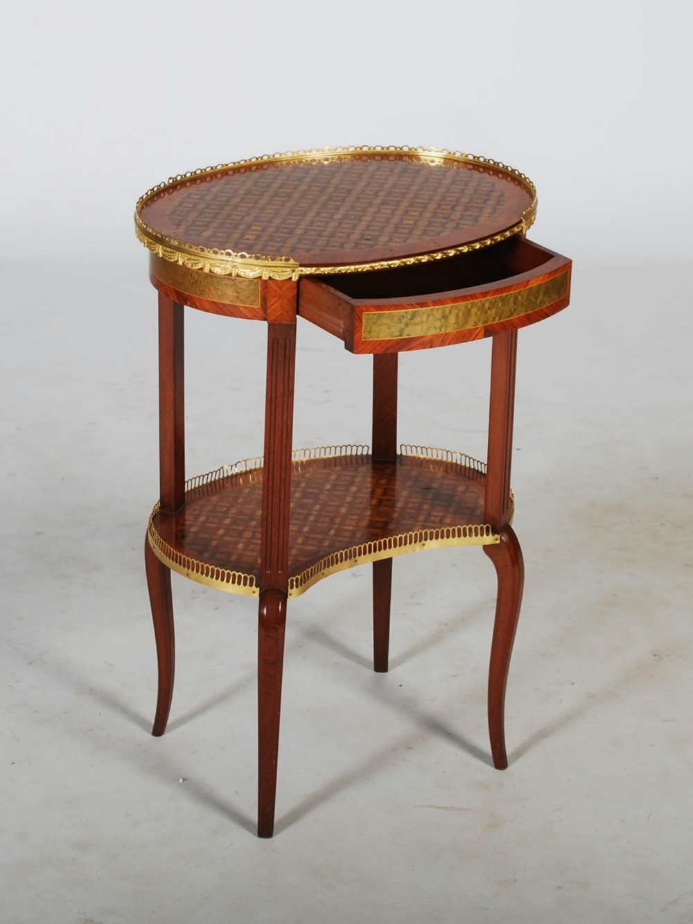 An early 20th century kingwood, parquetry inlaid and gilt metal mounted occasional table, the oval - Image 2 of 8