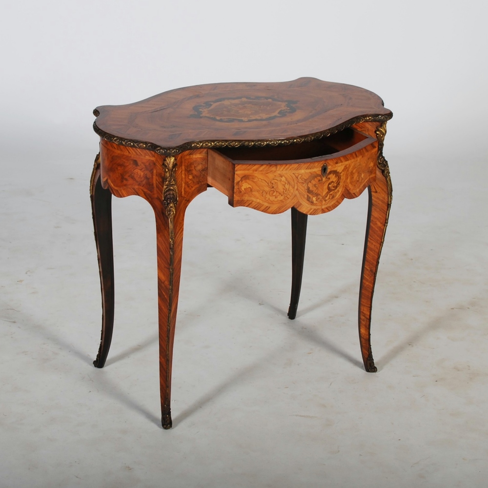 A late 19th century rosewood, marquetry and gilt metal mounted table, the shaped oval top - Image 2 of 4