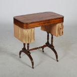 A Regency style rosewood and brass inlaid work table, the rectangular top with a hinged centre