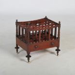 A 19th century mahogany Canterbury, of rectangular form with four divisions above a single drawer,