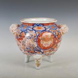 A late 19th/ early 20th century Japanese Imari Koro, decorated with circular panels of birds on a