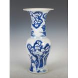 A Chinese porcelain blue and white yen yen vase, Qing Dynasty, decorated with prunus blossom, 46cm