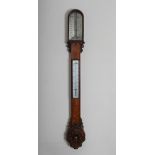 A Victorian oak stick barometer, H.Huges, 59 Fenchurch St. London, with silvered dial and adjustable