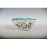 A Chinese porcelain famille rose square-shaped bowl, Qing Dynasty, decorated with rockwork,