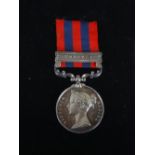 A Victorian Indian Service medal, inscribed to '3334. J WILKIE 93rd HIGHLANDERS' with UMBEYLA bar