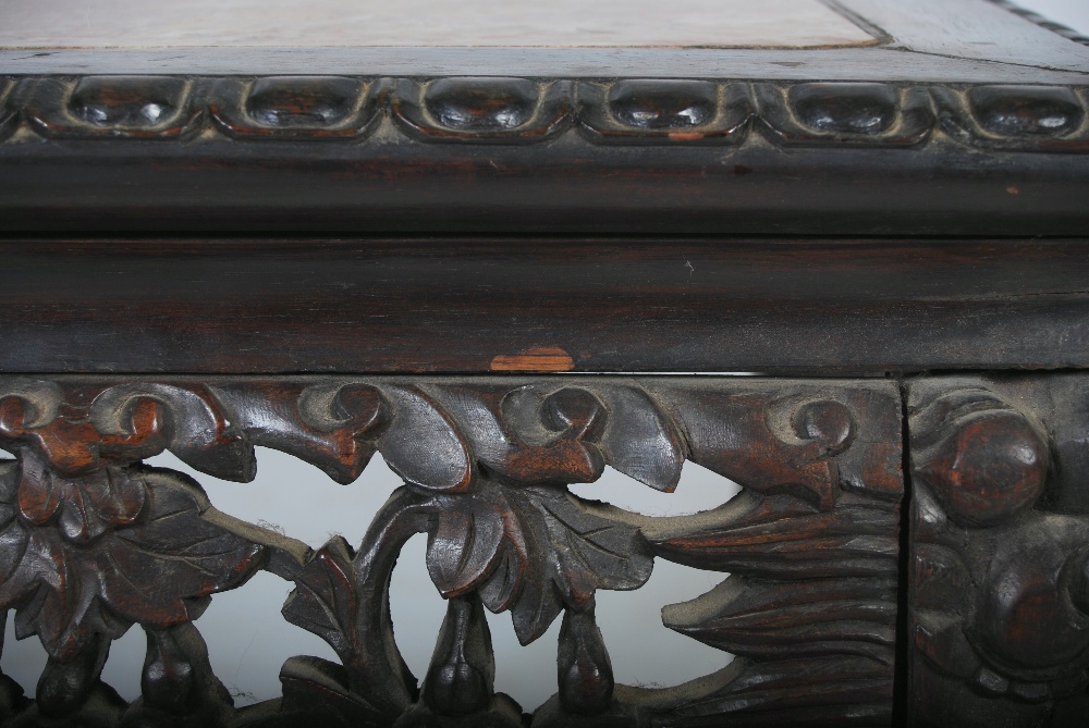 A pair of Chinese dark wood jardiniere stands, Qing Dynasty, the square shaped tops with mottled red - Image 4 of 6