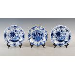A pair of 18th century Dutch Delft plates and another Delft plate, the pair of plates decorated with