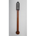 A 19th century oak stick barometer JAMES WHITE GLASGOW, with adjustable vernier and arched dial,
