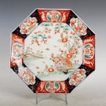 A Japanese Imari octagonal shaped dish, late 19th/ early 20th century, decorated with a pair of