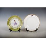 A Continental porcelain green ground cabinet plate, transfer printed with a lady wearing a purple