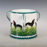 A Wemyss Ware pottery Loving cup, decorated with black cocks and hens within green line and dentil