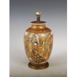 A Japanese Satsuma pottery vase, Meiji Period, decorated with lohan within richly gilded borders,