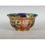 A Wedgwood Fairyland lustre bowl decorated by Daisy Makeig-Jones, decorated with imps and fairies in