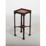 A 20th century George III style occasional table, the square top with gallery edge above a scroll