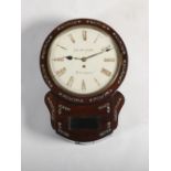A 19th century rosewood and mother-of-pearl inlaid single fusee drop dial wall clock J.R. & W.M.