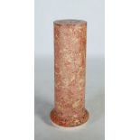 A late 19th century scagliola pedestal, of cylindrical form raised on a circular plinth base and