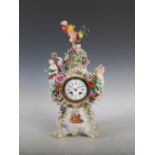 A 19th century Meissen porcelain Rococo style mantle clock HRY. MARC A PARIS, the 3 1/2" circular