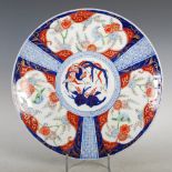 A Japanese Imari charger, late 19th/ early 20th century, decorated with a central roundel