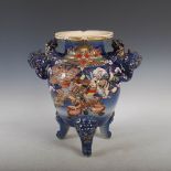 A Japanese Satsuma pottery blue ground koro, early 20th century, decorated with Samurai, with shishi
