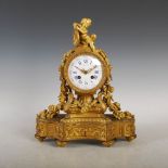 A 19th century French ormolu mantle clock RAINGO FRES. A PARIS, the 4" circular convex dial with