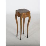 A late 19th/ early 20th century French painted occasional table, the hinged top decorated with