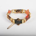 A late 19th century Scottish agate bracelet, formed from six polished agate panels lined by yellow
