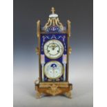 A late 19th century French gilt metal and cloisonne mantle clock with day, date and month dial,