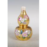 A late 19th century German porcelain Augustus Rex double gourd form vase, decorated with floral