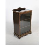 A Victorian ebony, boxwood lined and gilt metal mounted pier cabinet, the rectangular top with