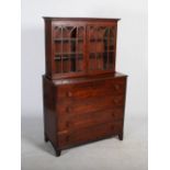 A 19th century mahogany secretaire chest with associated George III bookcase top, the associated top