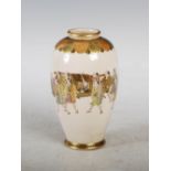 A Japanese Satsuma pottery vase, Meiji Period, decorated with a procession of figures carrying a