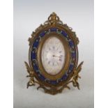 A 19th century gilt metal and champleve enamel strut clock HOWELL, JAMES & CO., LONDON, the silvered