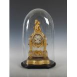A late 19th century French alabaster and gilt metal mounted mantle clock, the circular dial with