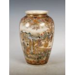 A Japanese Satsuma pottery vase, Meiji Period, decorated with shaped panels of figures in a river