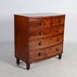 A 19th century mahogany bow front chest, the shaped rectangular top above two short and three long