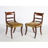 A matched set of twelve 19th century Regency and later mahogany dining chairs, comprising six with