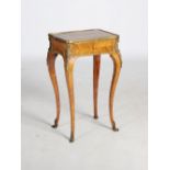 A French Louis XV style kingwood and ormolu mounted side table, the cross banded rectangular top