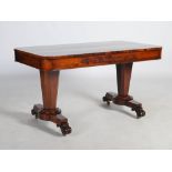 A 19th century rosewood library table, the rounded rectangular top above opposing blind frieze