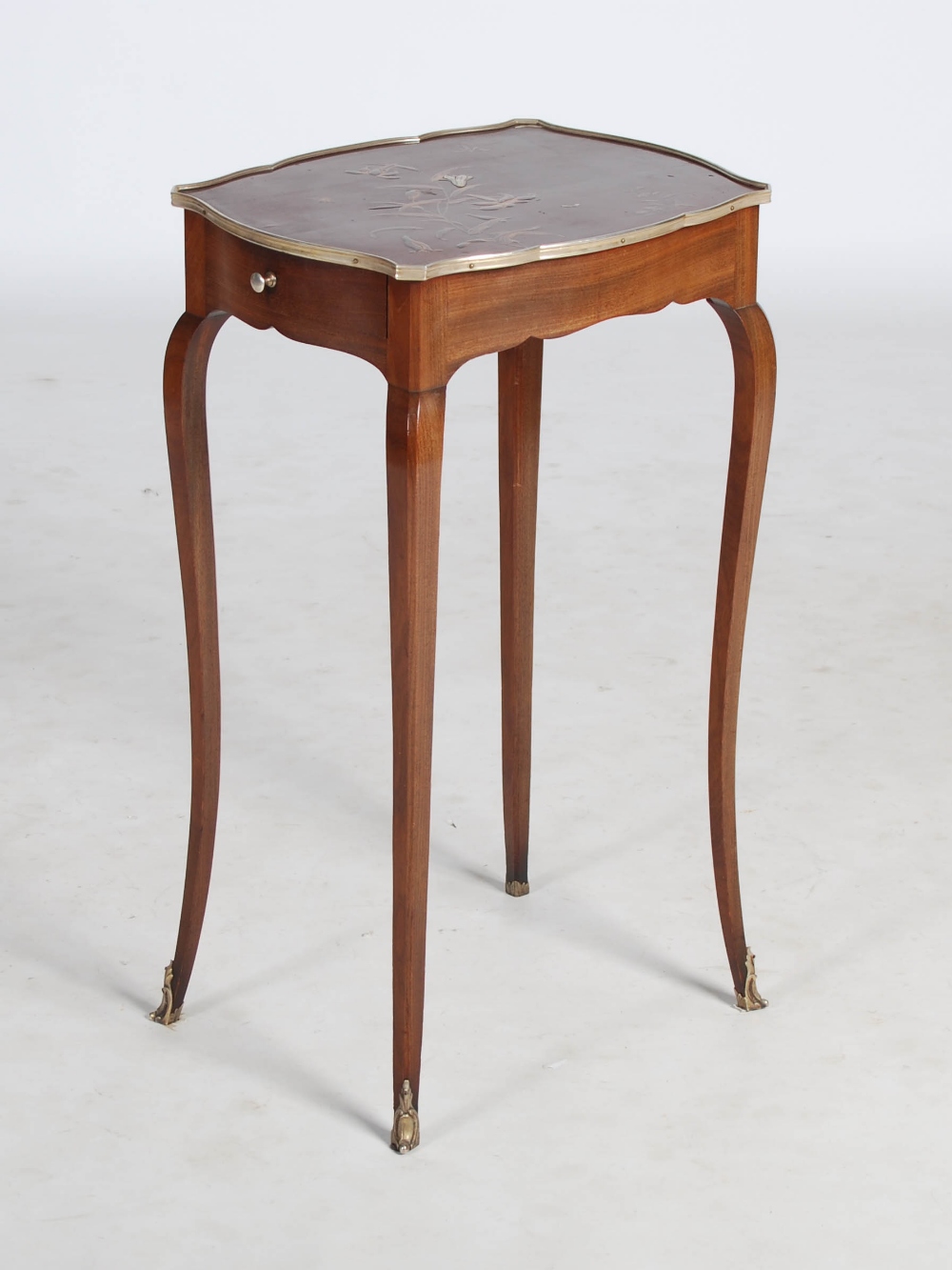 An early 20th century French mahogany, lacquer, mother-of-pearl inlaid and silver metal mounted