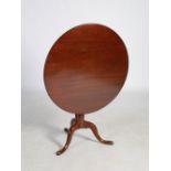 A 19th century mahogany snap top occasional table, the hinged circular top on a baluster turned