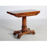 A 19th century mahogany games table, the hinged rectangular top opening to a red baize lined