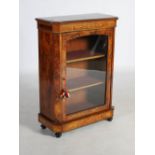 A Victorian walnut, marquetry and gilt metal mounted pier cabinet, the rectangular top above a