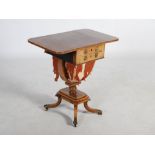 An early 19th century rosewood, gilt metal mounted and boxwood lined work table, the rectangular top
