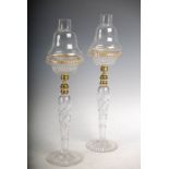 A pair of gilt metal mounted CRICKLITE CLARKES PATENT cut and moulded glass candlesticks and shades,