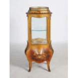 An early 20th century free standing Vernis Martin type vitrine, with a glazed cupboard door