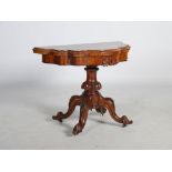 A Victorian walnut demi-lune card table, the shaped hinged top above a plain frieze centred with