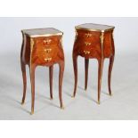 A pair of French Louis XVI style kingwood and gilt metal mounted bedside tables, the shaped